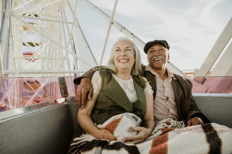 Happy senior couple on a Ferris wheel